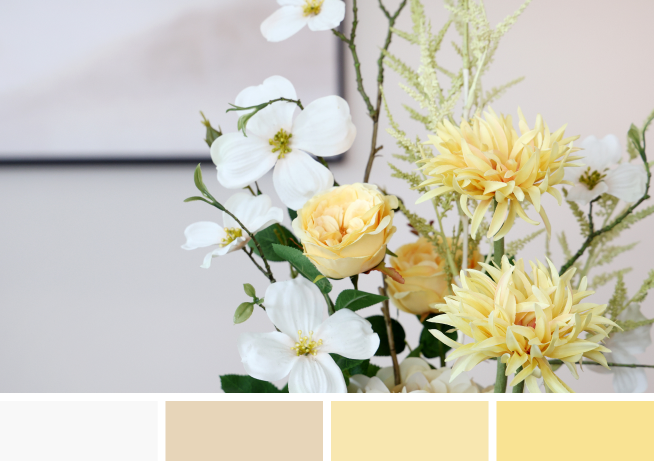 Gelber Blumenstrauss mit gelben Farbkacheln.