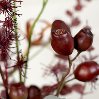 Detailbild einer Blüte vom künstlichen Blumenstrauß African Sunset von Lumisa’s Choice in warmen Farben.