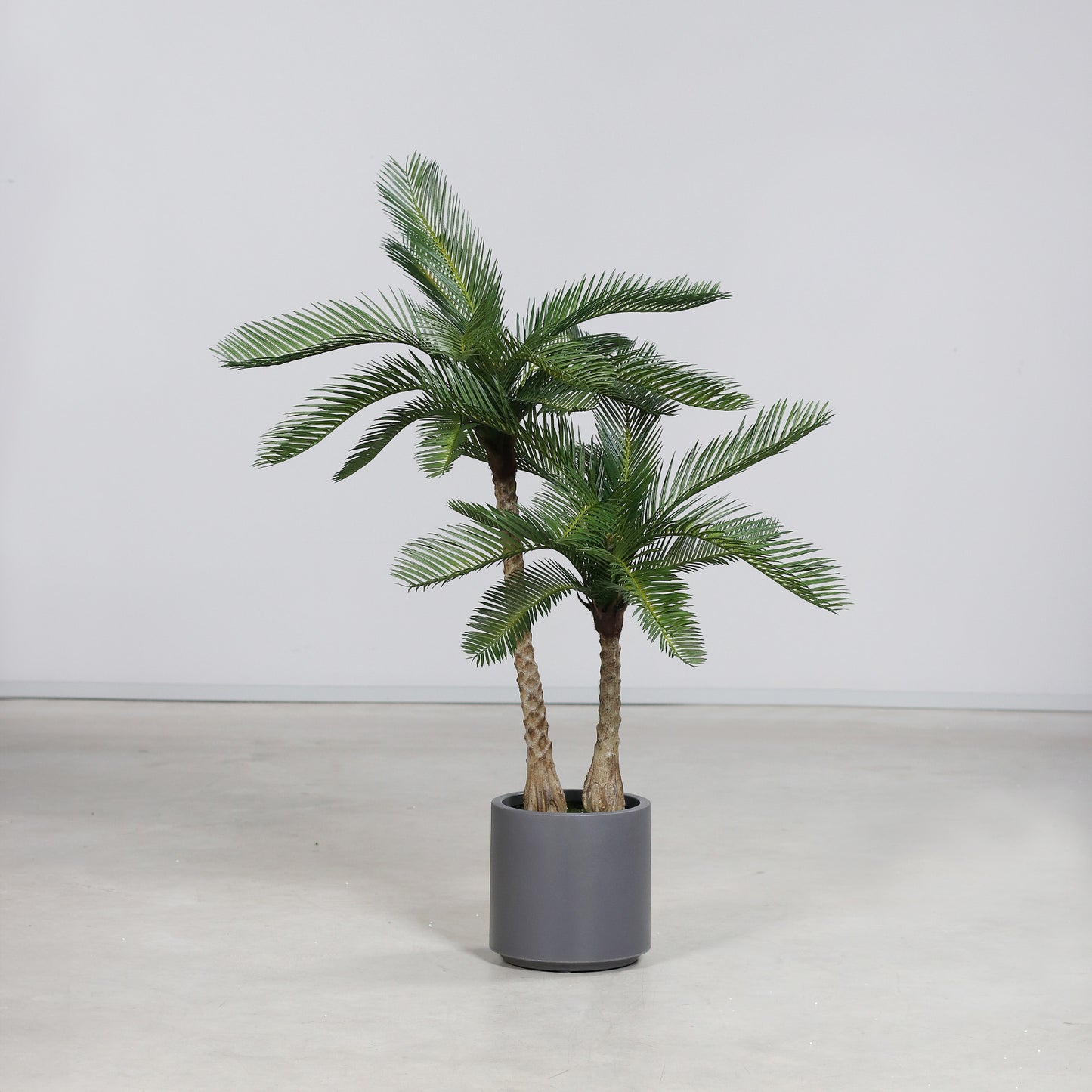 Künstliche Grünpflanze Cycas Palme mit grauem Topf